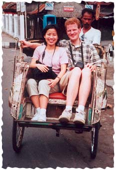 The two of us riding a becak